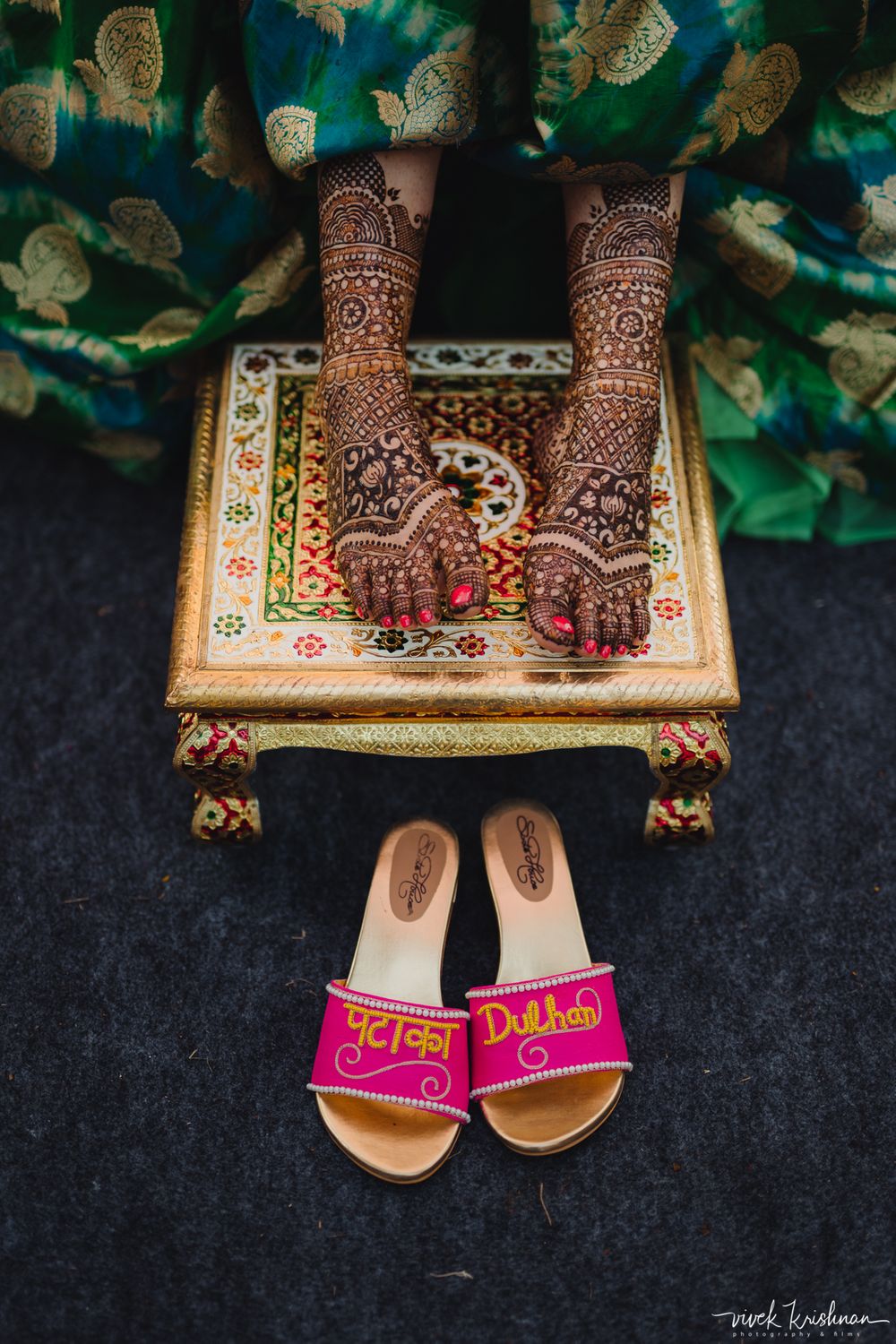 Photo of A bride flaunting the bridal mehendi design on her feet