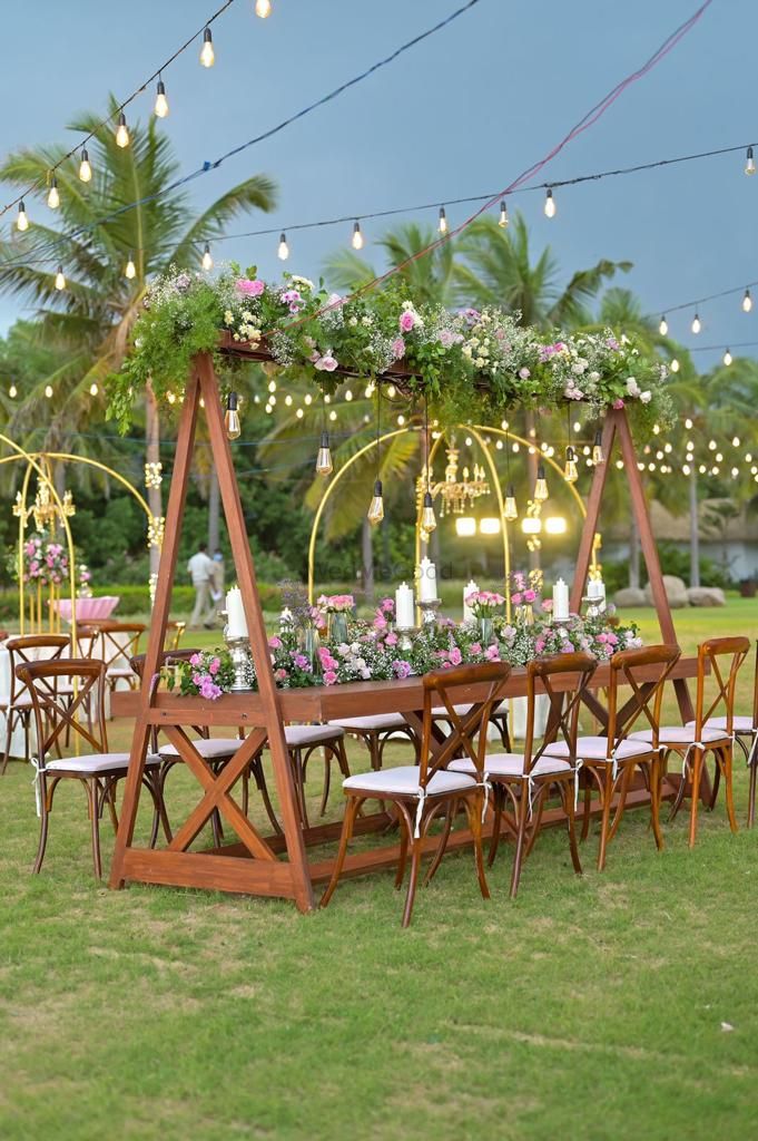 Photo of Outdoor table setting decor for an Indian wedding