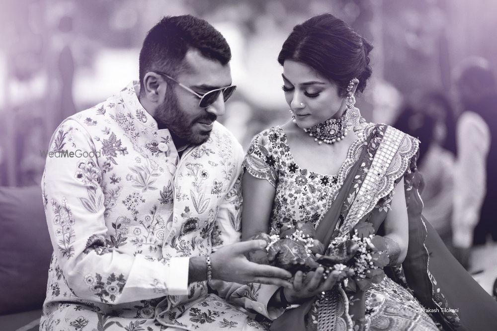 Photo of black and white mehendi couple portrait