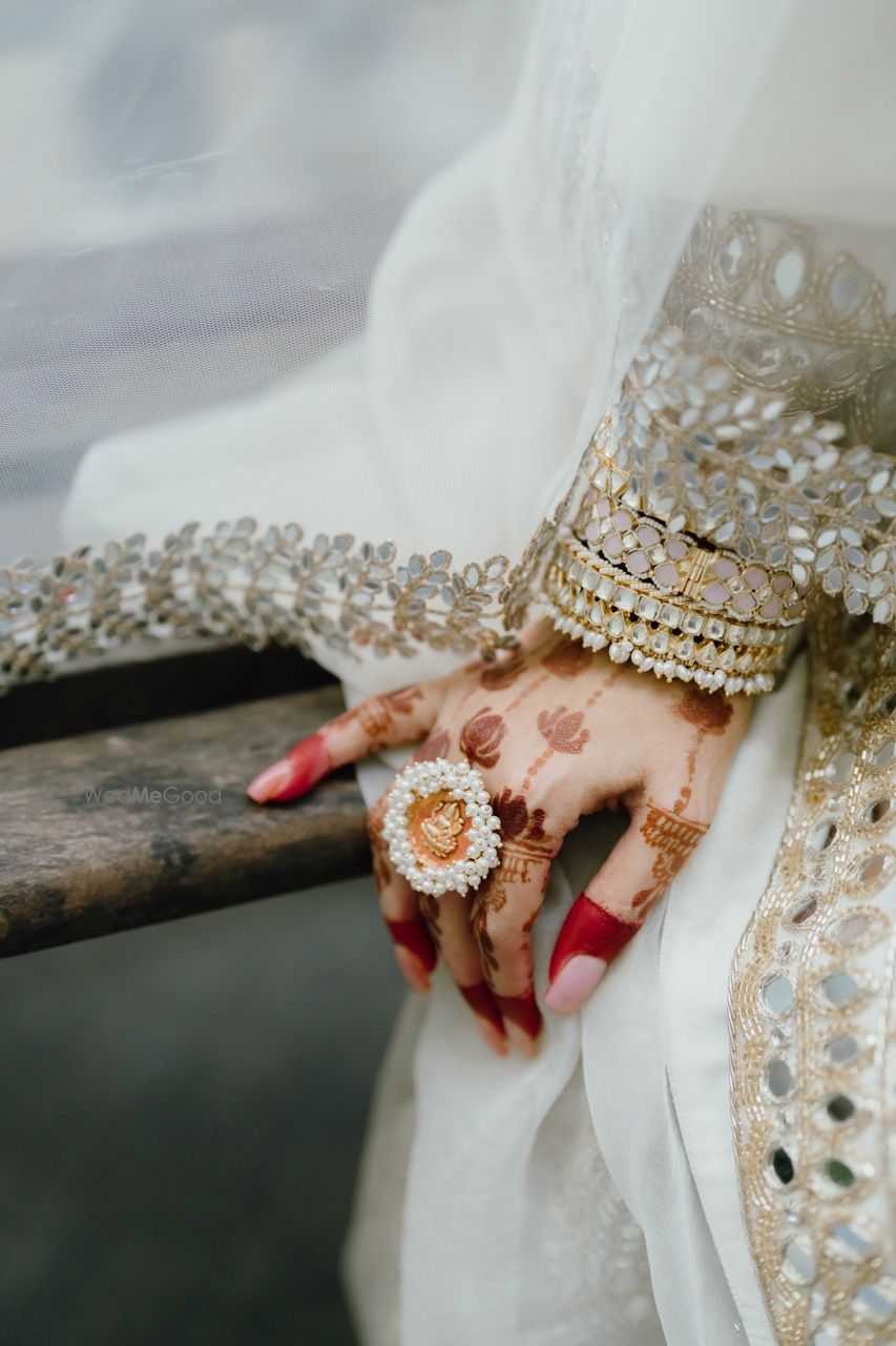 Photo of Statement cocktail ring with pearls and stacked kundan bangles
