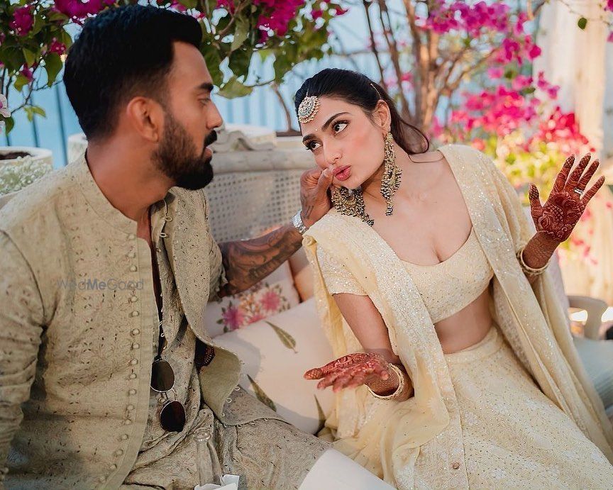 Photo of Cute Couple Pose Inspiration By Athiya Shetty and KL Rahul at Mehendi