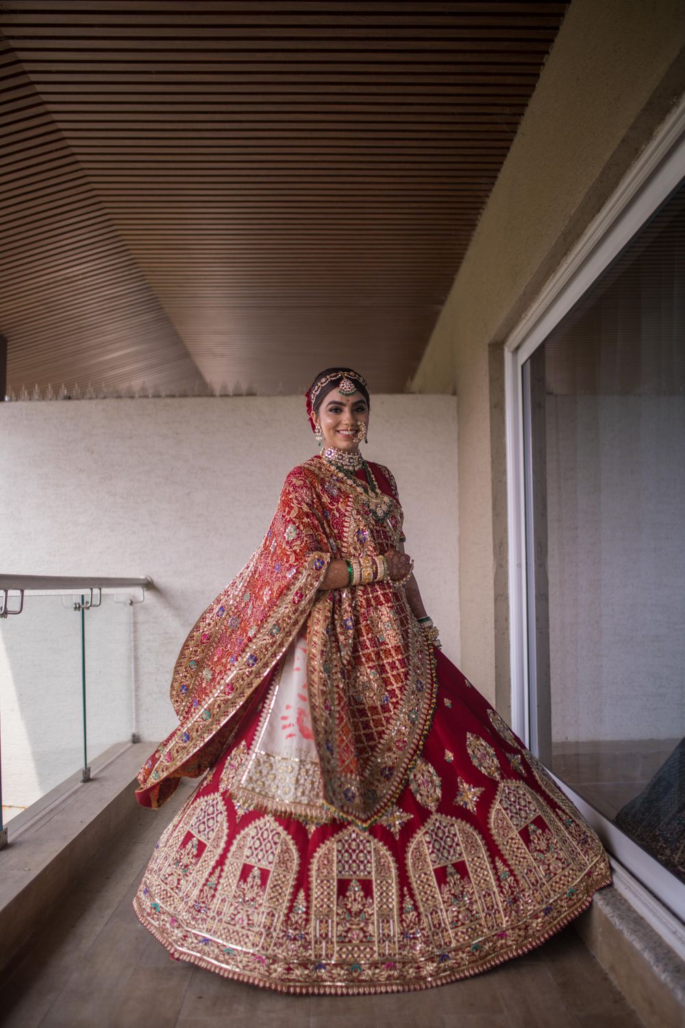 Photo of pretty bridal lehenga shot with unique embroidery