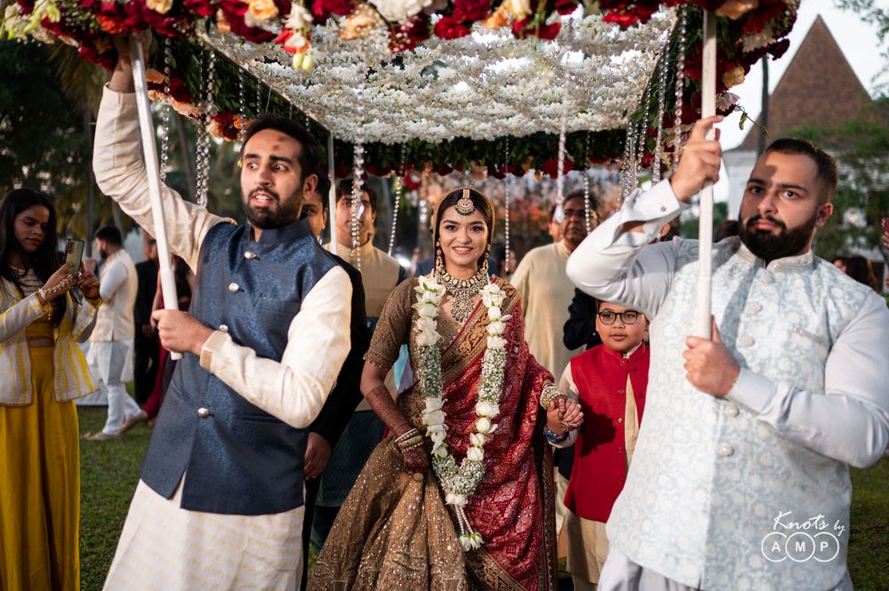 Photo of happy bridal entry under phoolon ki chadar with her brother