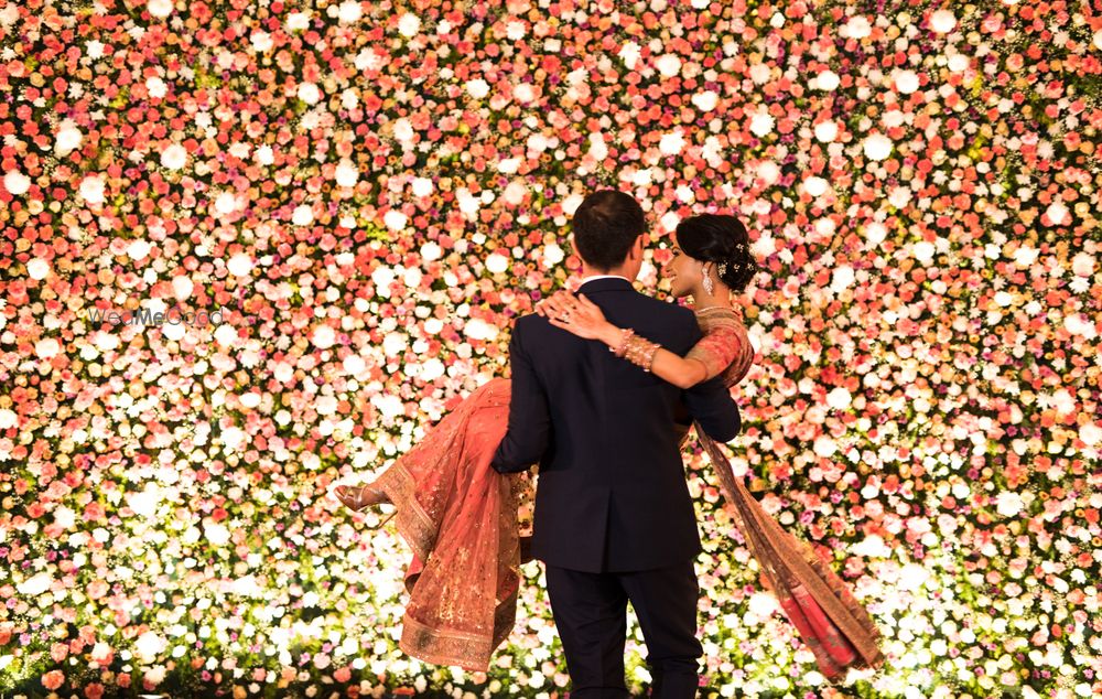 Photo of Floral wall decor for engagement stage decor