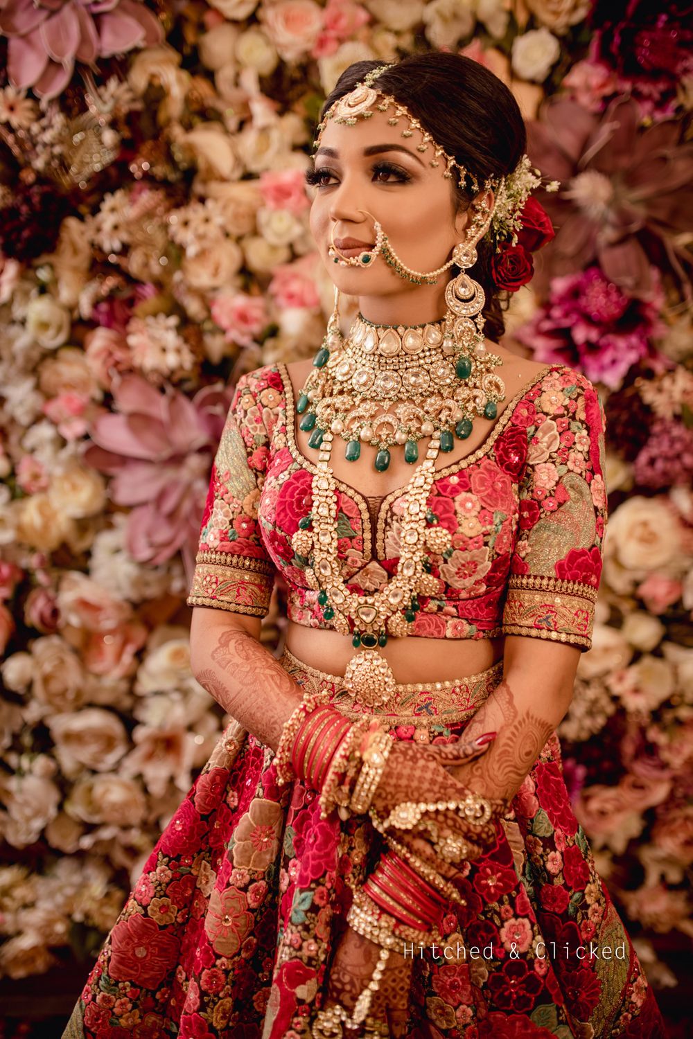 Photo of Bridal portrait with layered jewellery and sabyasachi lehenga