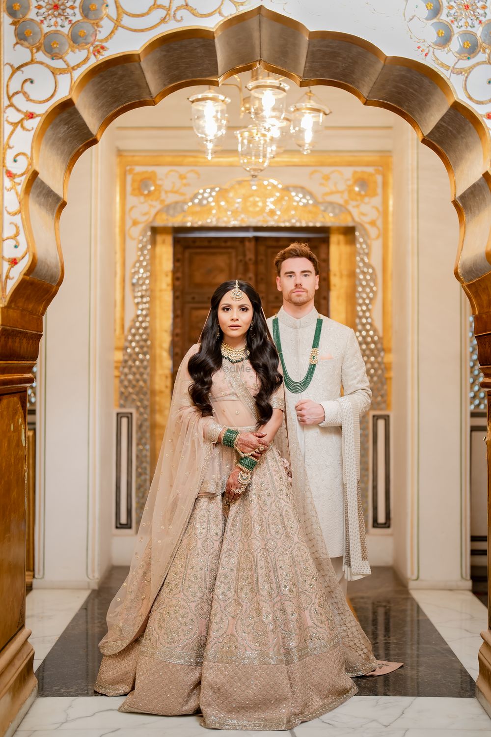 Photo of bride and groom portrait with matching jewellery