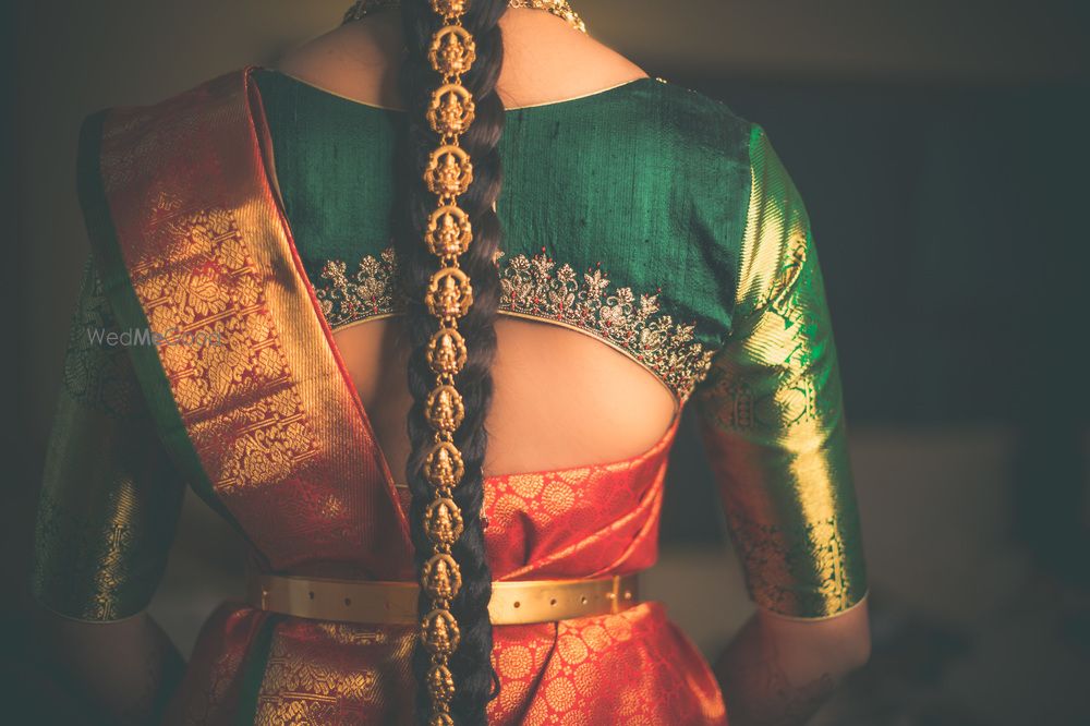 Photo of South Indian bridal hairstyle and blouse back shot