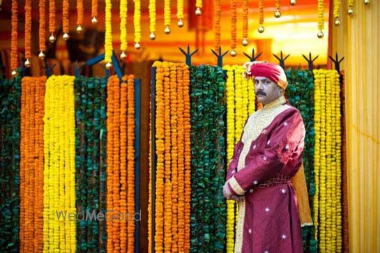 Photo of orange and yellow genda flower entrance