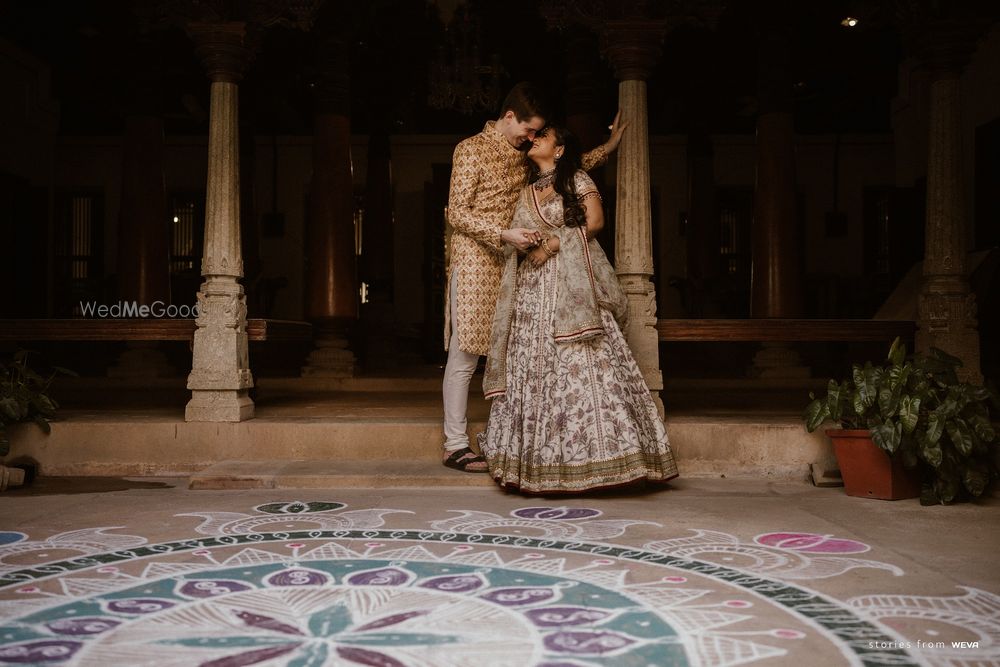 Photo of bride and groom in neutral outfits shot