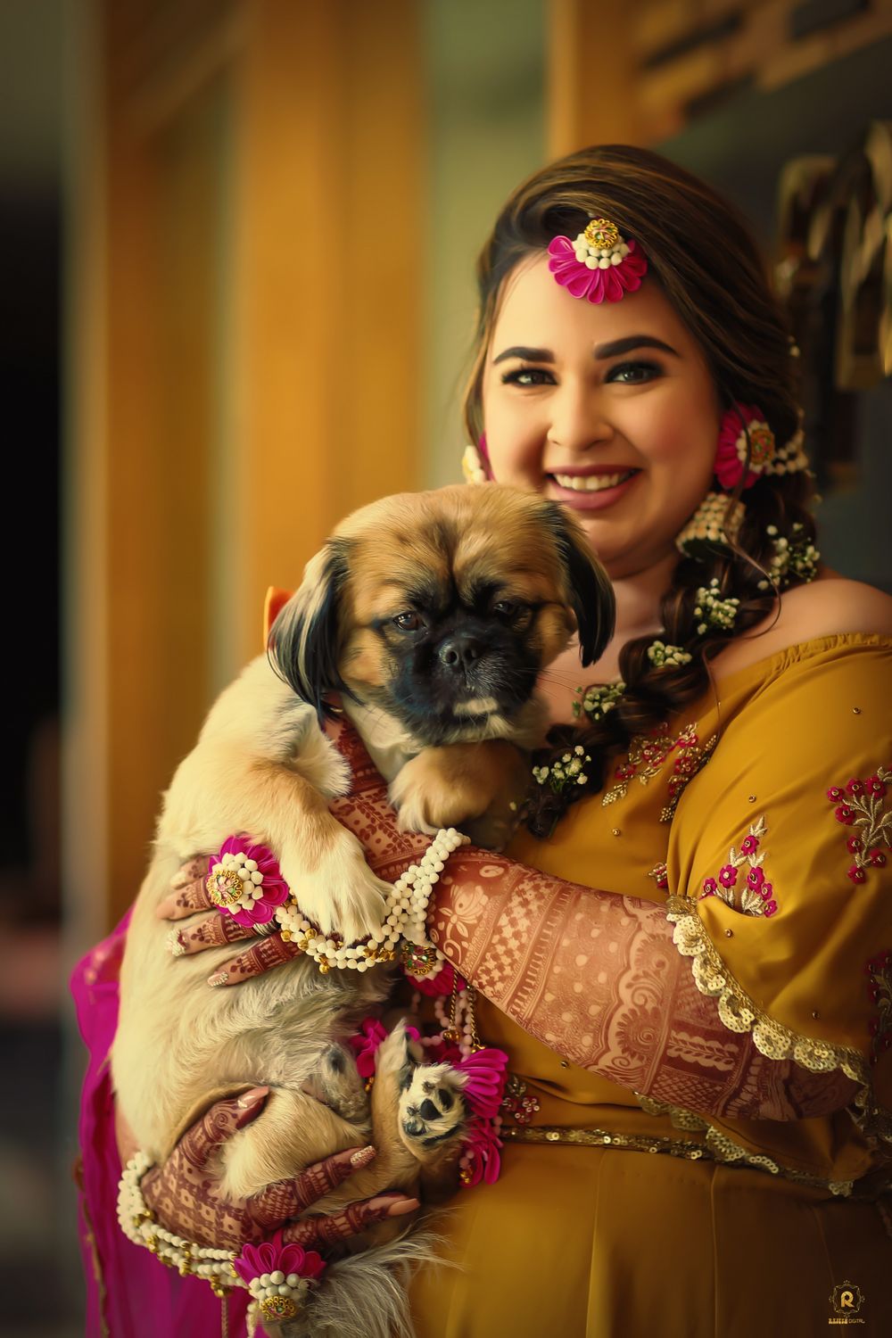 Photo of bridal portrait with her dog on mehendi day