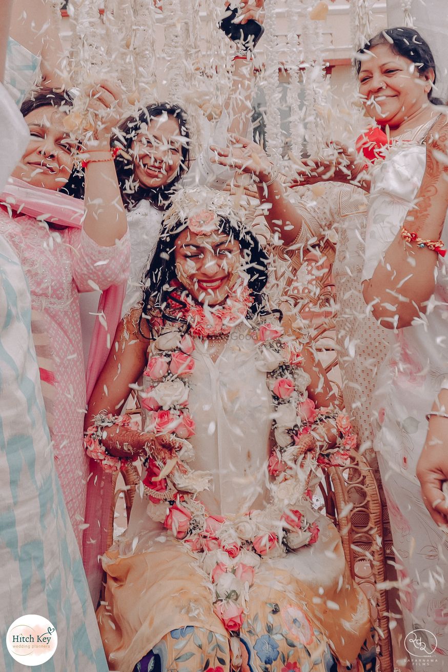 Photo of Fun bridal portrait from floral haldi ceremony