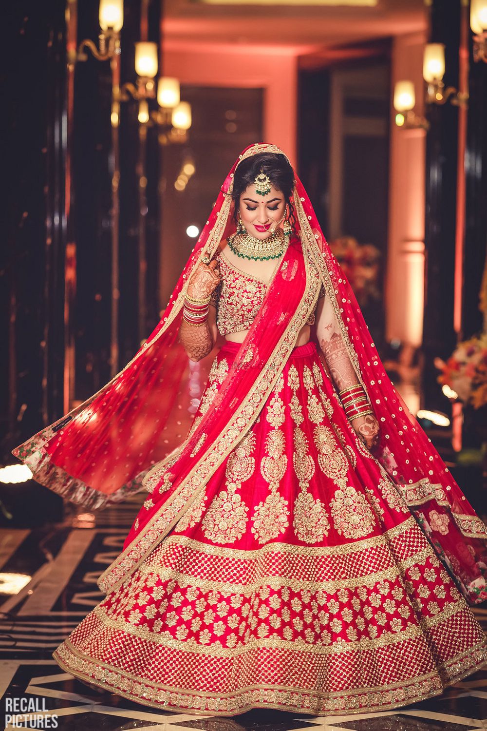 Photo of Red and gold lehenga with big butis
