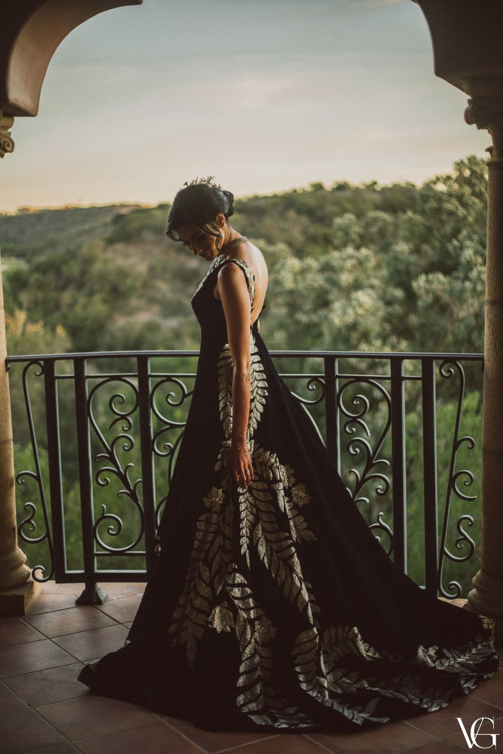 Photo of Bride wearing a black and silver manish malhotra gown for her cocktail