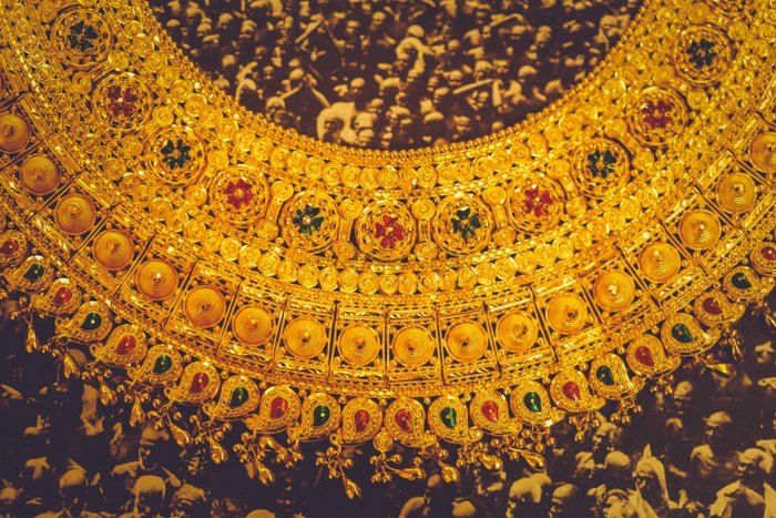 Photo of traditional gold bridal jewellery with precious gem stones