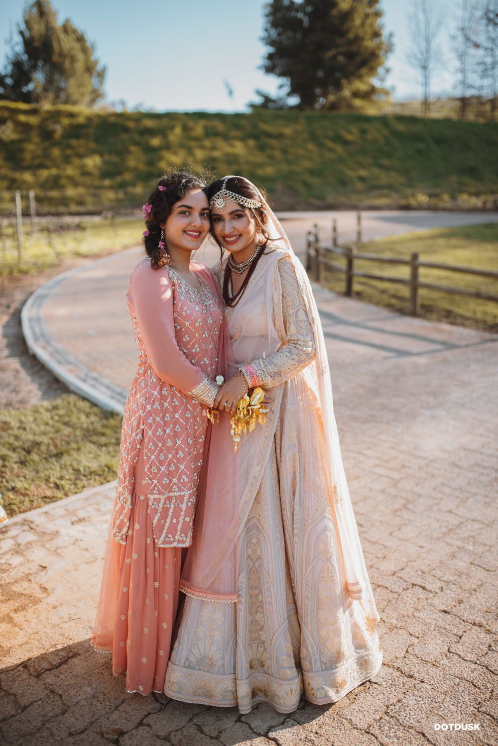 Photo of Pastel bride with sister