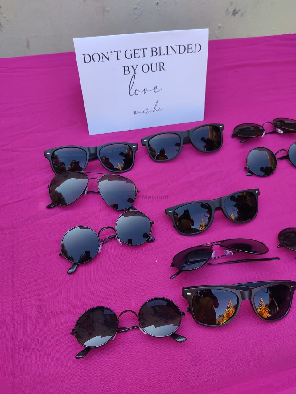 Photo of sunglasses as favours for mehendi on table