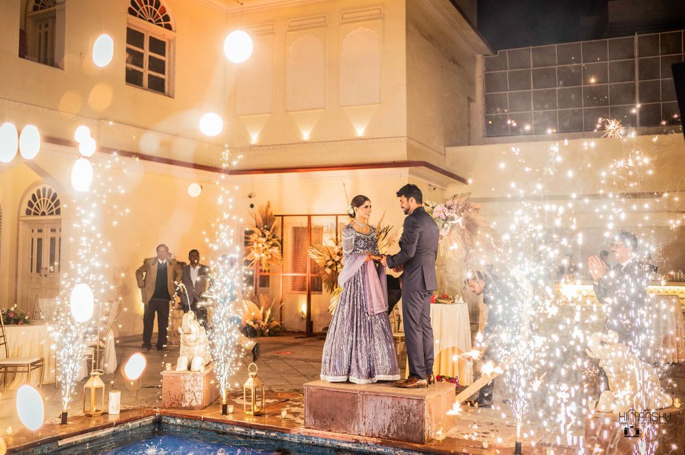 Photo of Poolside engagement ceremony decorated with fairy lighting decorations