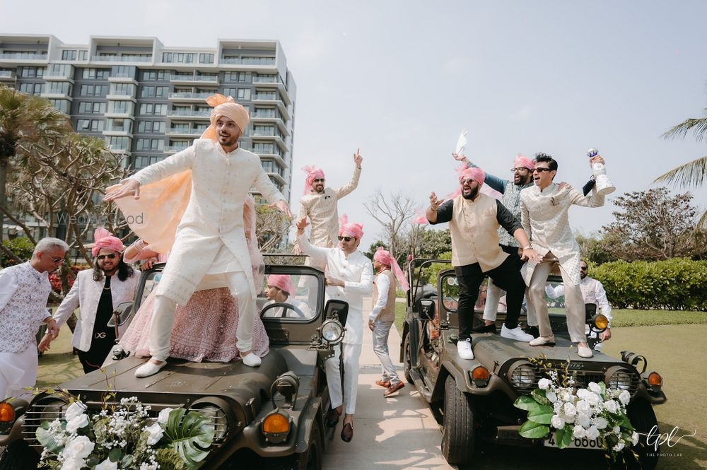 Photo of Groom entering the wedding with his baraatis dancing