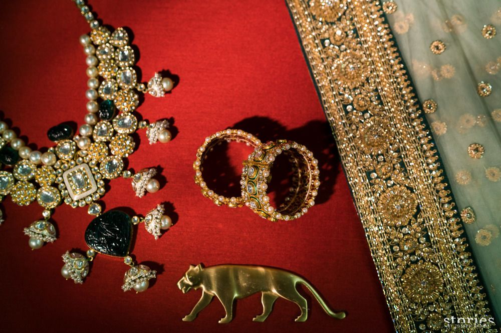 Photo of Bridal getting ready shot idea with accessories and Sabyasachi logo