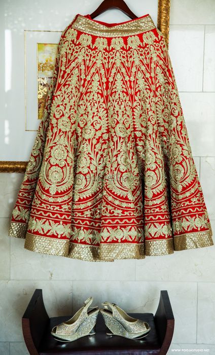 Photo of Red all over embrpidered bridal lehenga