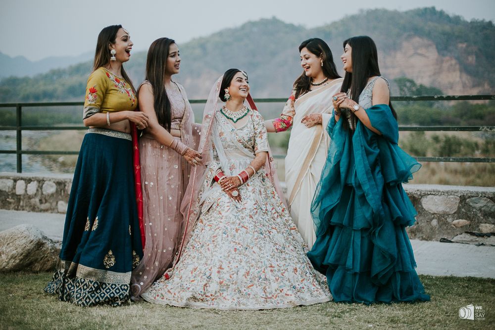 Photo of Bride with her bridesmaids