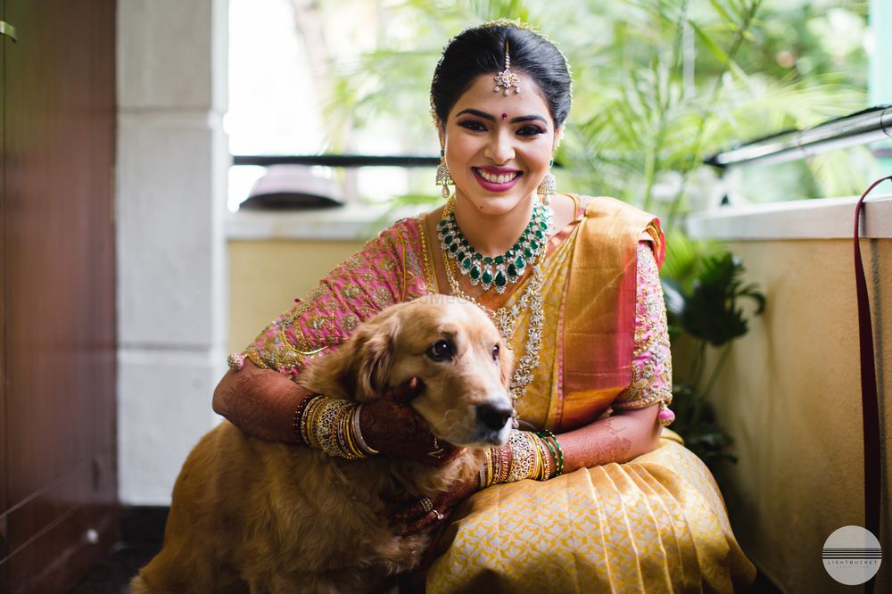 Photo of South Indian bride with dog