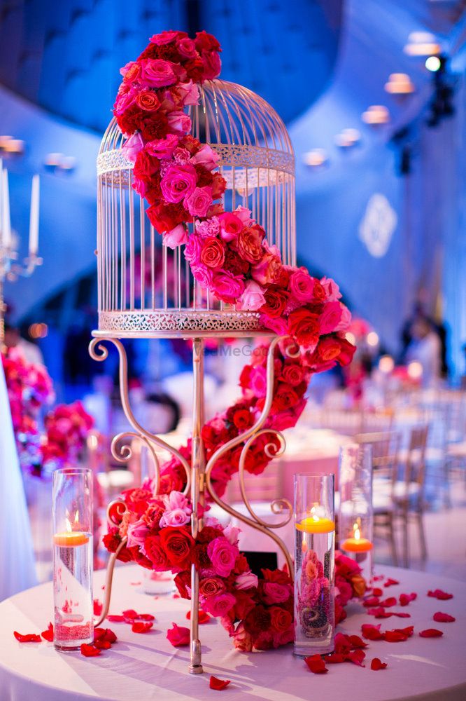 Photo of Bird Cage Candlestand with Floral Arrangement
