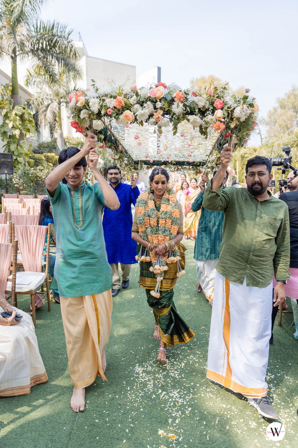 Photo of bride under phoolon ki chadar