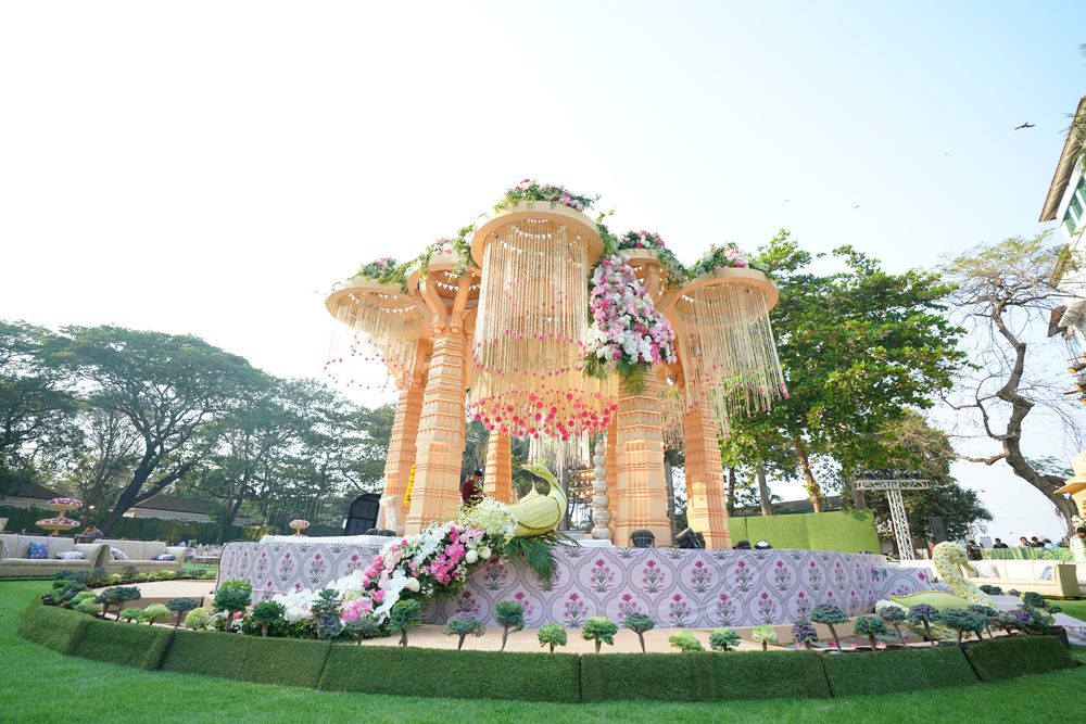 Photo of Unique shaped mandap with floral strings