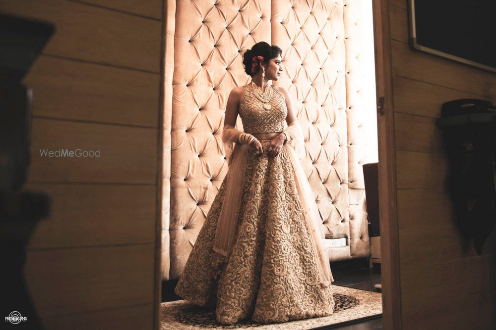 Photo of Offbeat gold reception lehenga