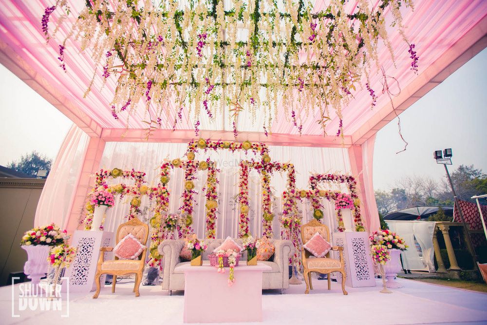 Photo of Fairytale wedding stage decor in pastels