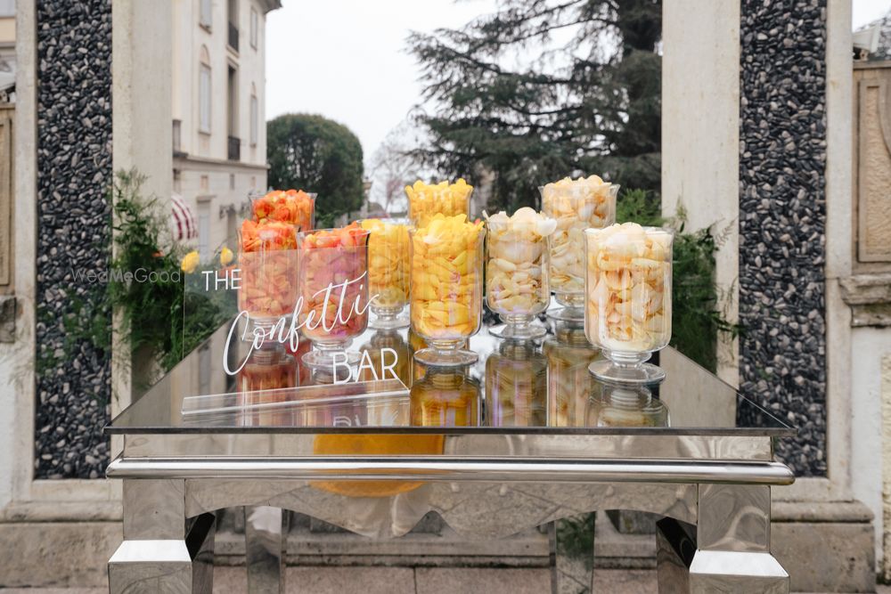 Photo of Fun element in wedding with a colourful confetti bar