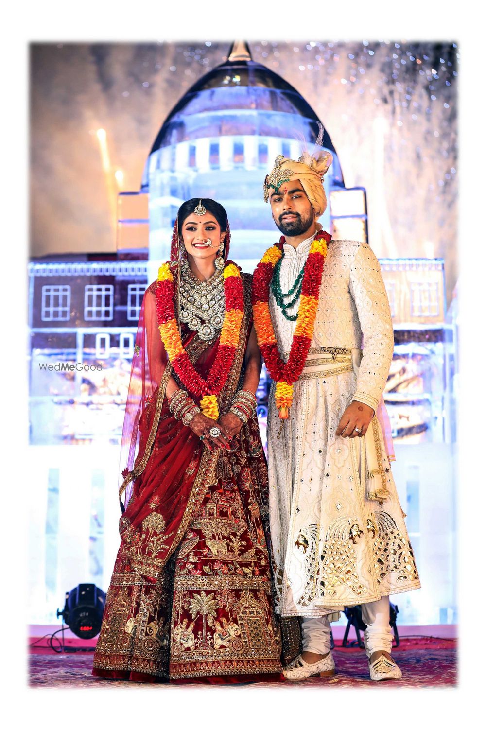 Photo of A bride and groom pose on their wedding day