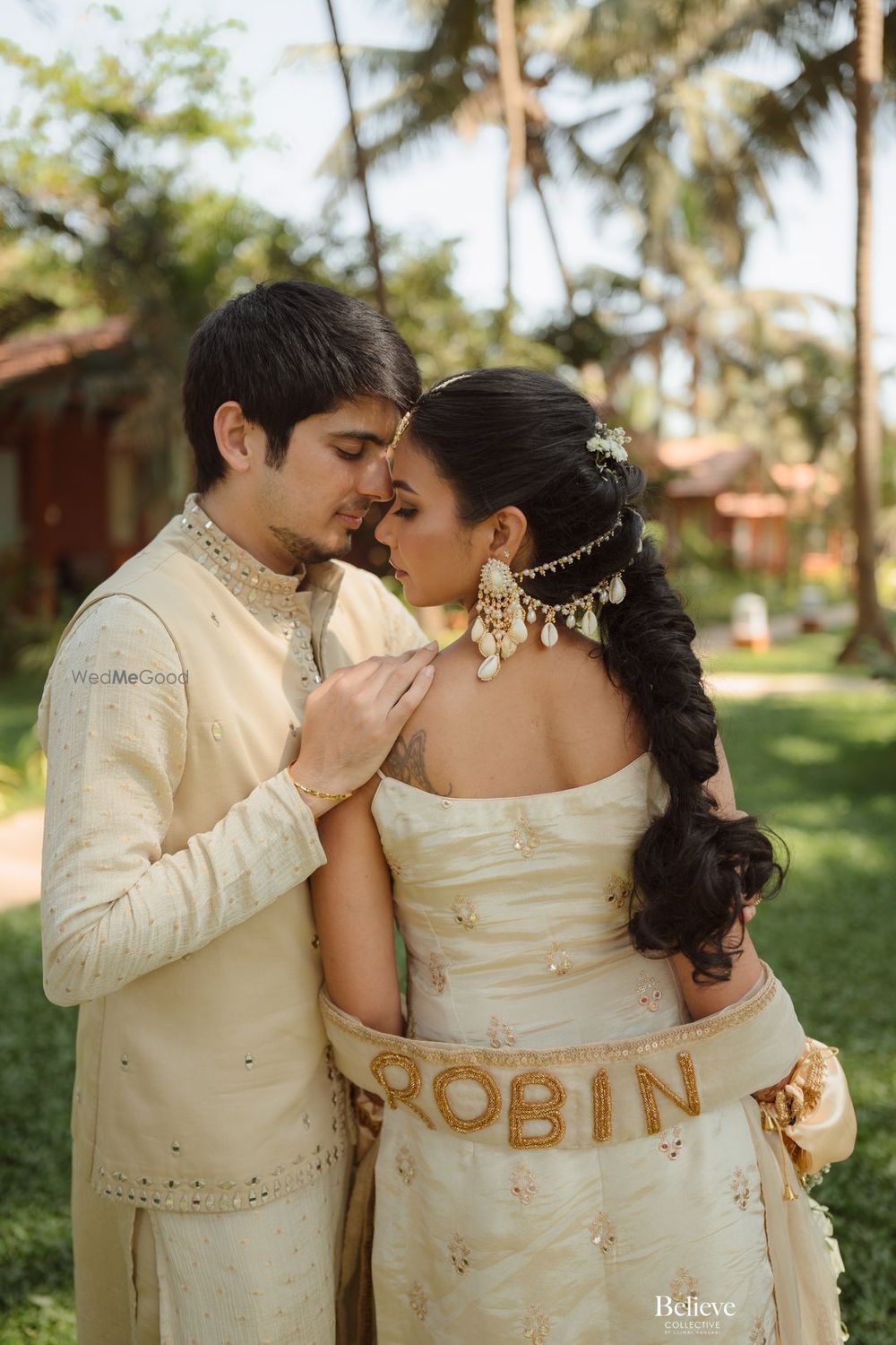 Photo of Stunning cowrie shell earrings with hair veils for the haldi look for the bride
