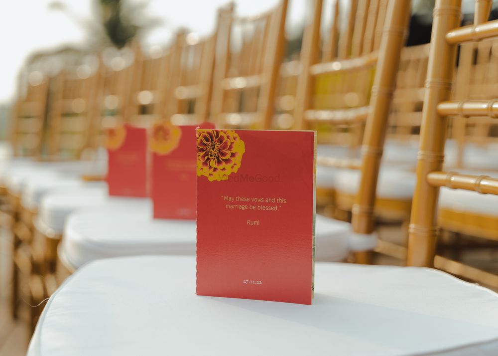 Photo of Beautiful wedding day itinerary cards for guests on wedding chairs