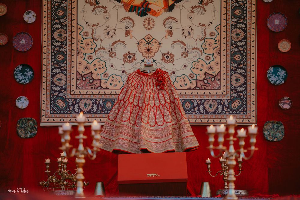 Photo of Red bridal lehenga on hanger