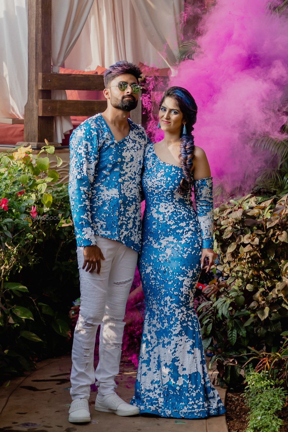 Photo of Pool party twinning bride and groom