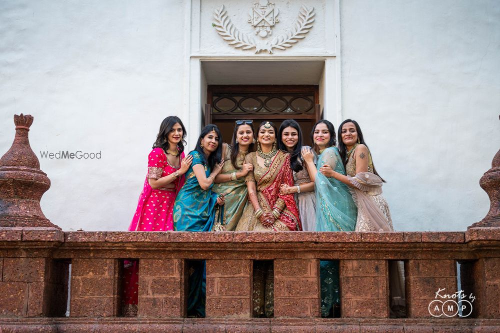 Photo of beautiful bride with her bridesmaids