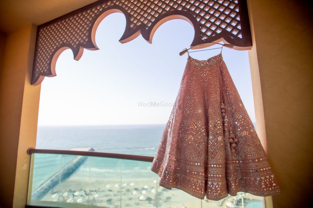 Photo of Lehenga on hanger in the balcony