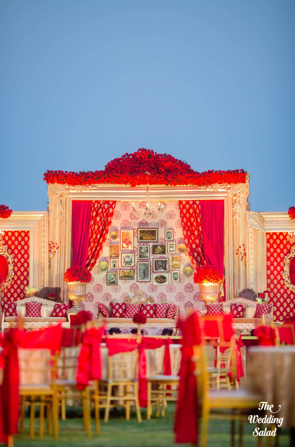 Photo of Unique wedding decor with red and gold theme