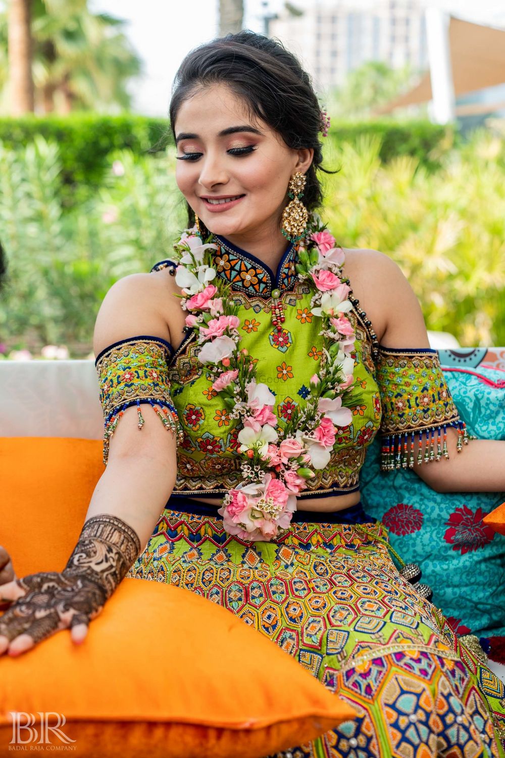 Photo of Mehendi outfit with green cold shoulder blouse