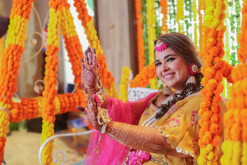 Photo of mehendi or haldi bridal portrait in yellow