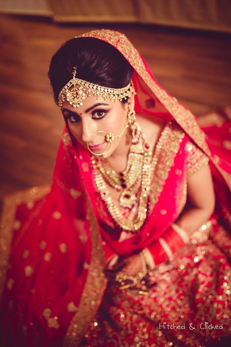 Photo of Bride in pink lehenga