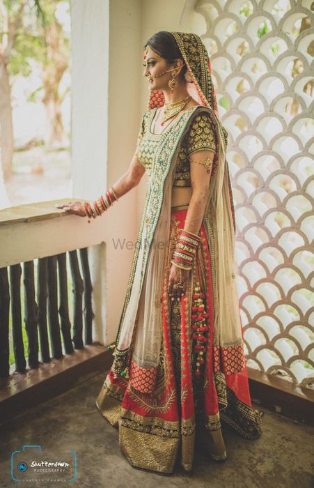 Photo of red and green lehenga