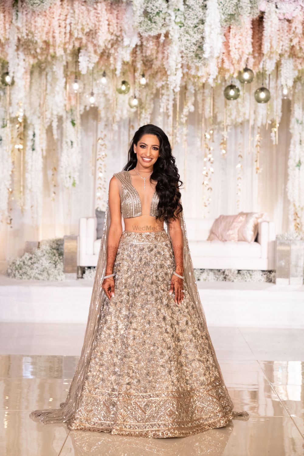 Photo of Silver manish malhotra lehenga with unique blouse and attached dupatta