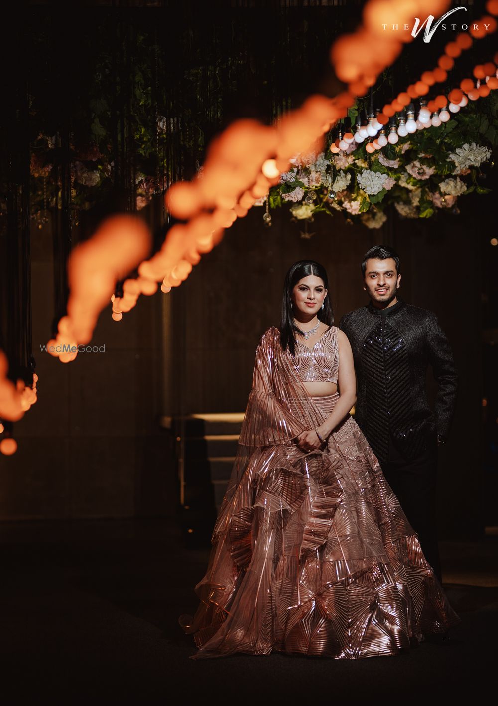 Photo of Couple posing together.