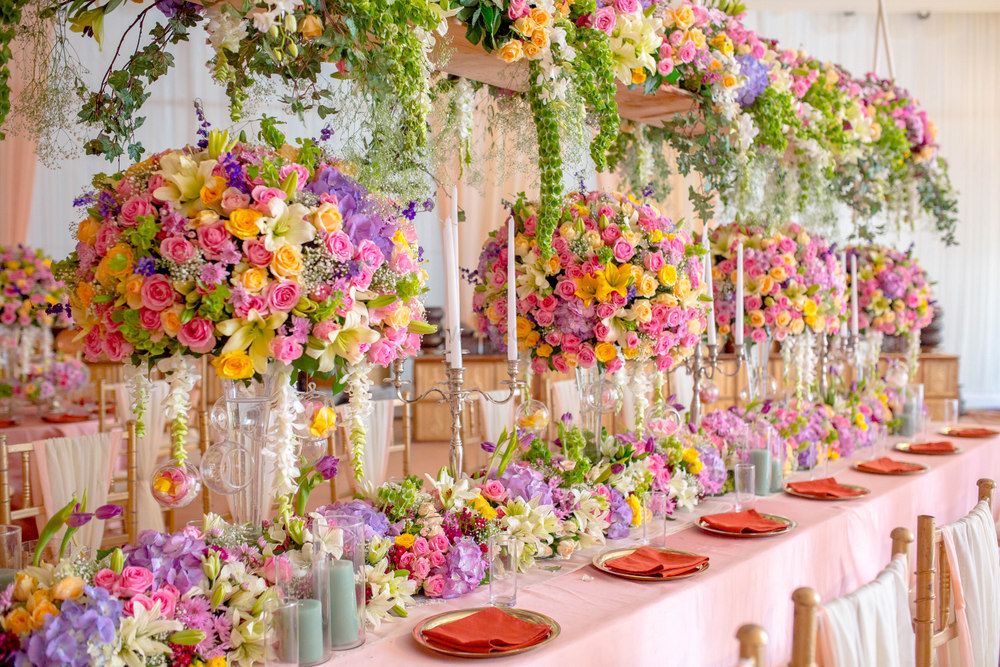 Photo of Intimate table setting with hanging trellis