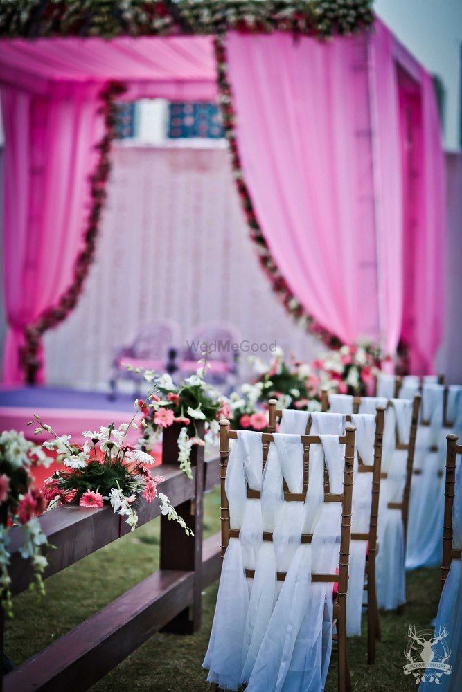 Photo of Chair back decor at wedding