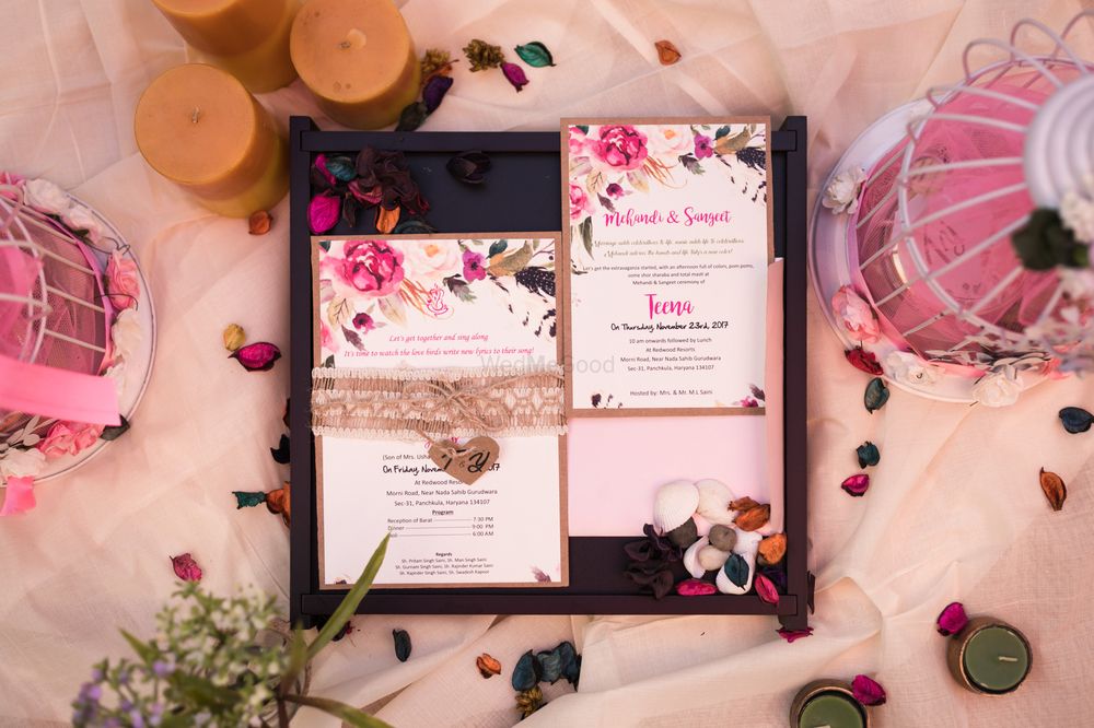 Photo of Pastel wedding card with black box