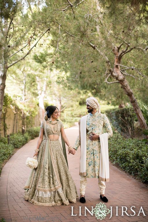 Photo of Post wedding shot with matching couple outfits